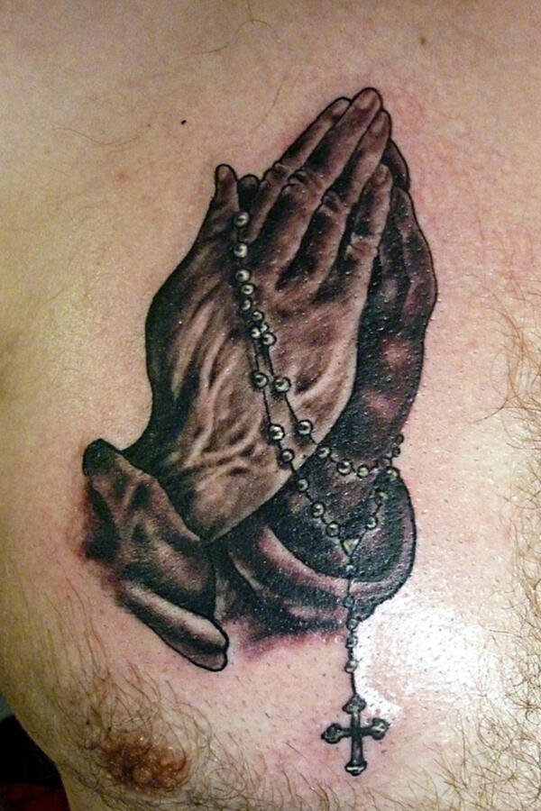 praying hands tattoo Dublin